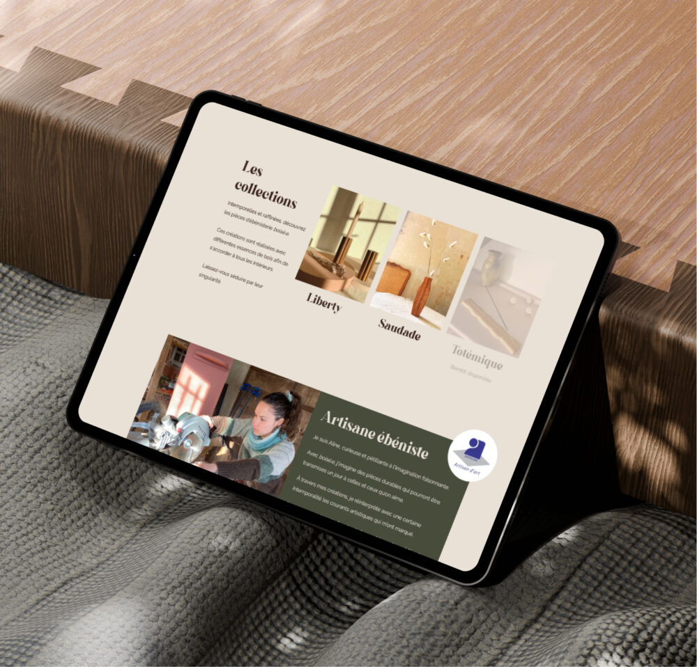 Tablette affichant des collections d'objets artisanaux et la mention "Artisane ébéniste
